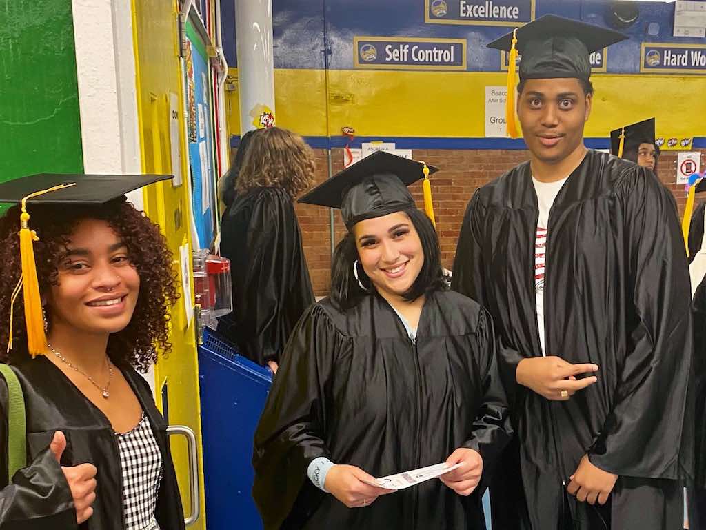 3 students at CAS graduation