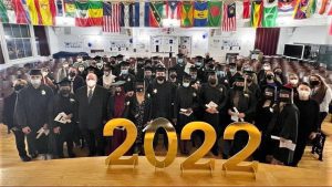 MCNDHS graduates pose in caps & gowns for Winter Graduation 2022