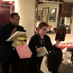 ED Michael Roberts presents plaque to AED Margaret Aylward