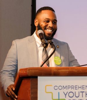 Omari Romain speaking