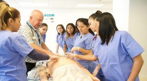 students participate in medical training