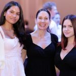 Rachel Potts, Director of the AtomicMind Foundation, at the 2024 CYD Spelling Bee with AtomicMind scholarship recipients Elizabeth and Sheyla