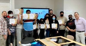 Group of students doing video game development