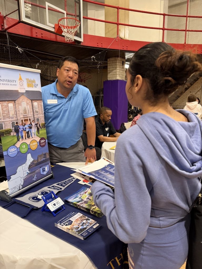 Student speaking with a college representative