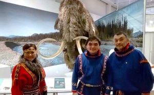 MCNDHS student Vova posing with display at Natural History Museum