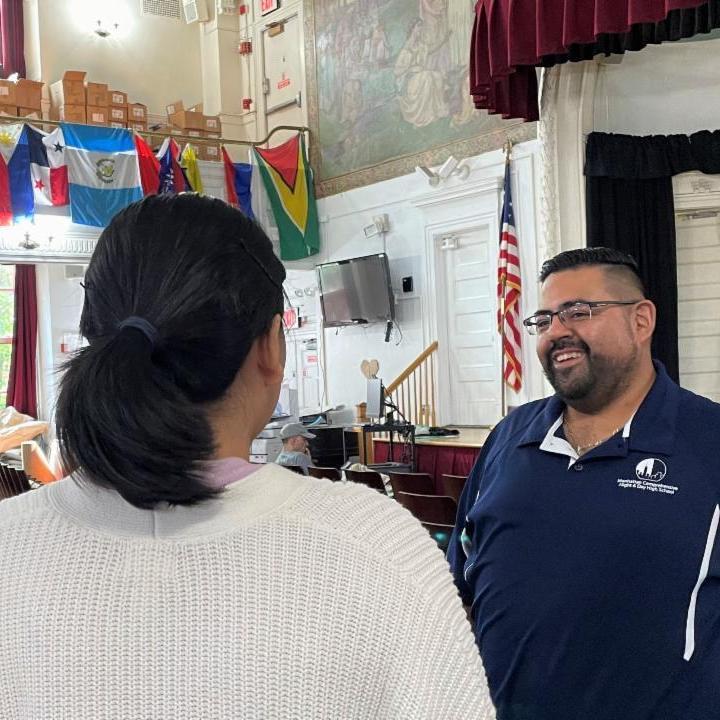 Teacher Windsor Tastaca welcomes new immigrant students