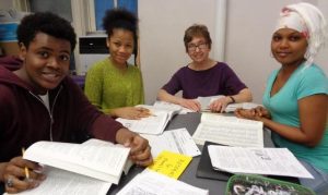 Tutor Nancy O'Donohue with MCNDHS students